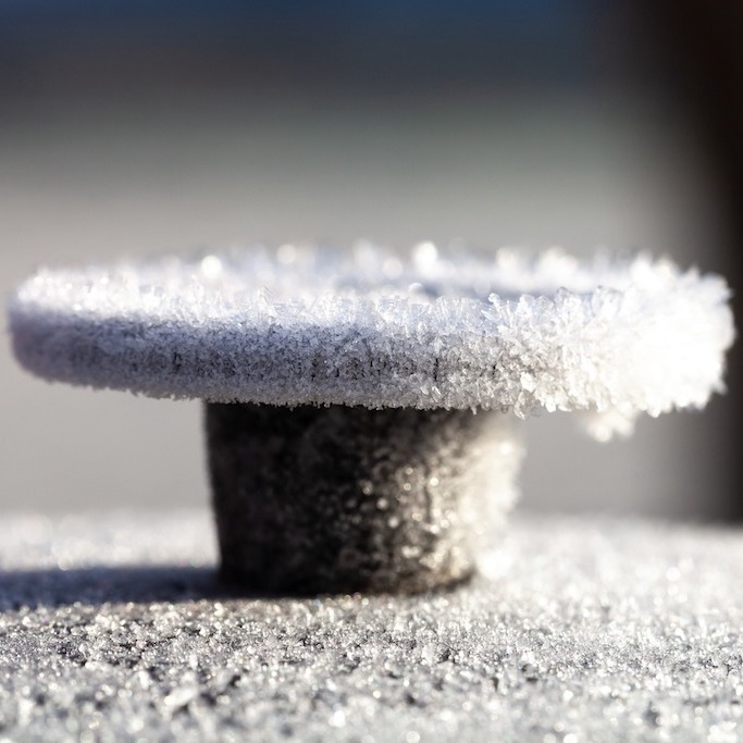 Frozen nozzle pictured outside covered in frost